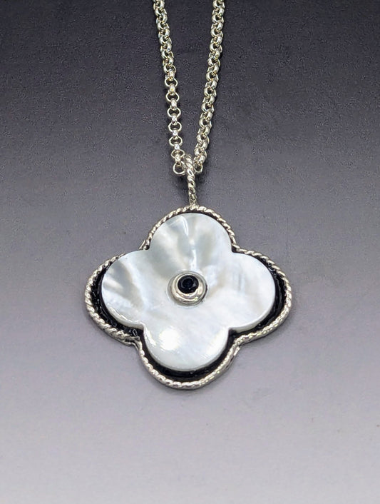 Clover mother of pearl pendant with black surround